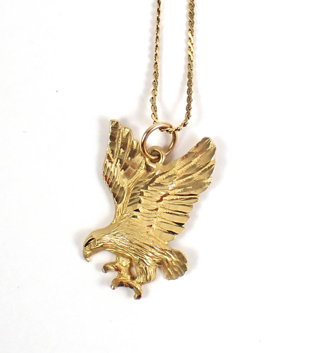 FOURTEEN KARAT YELLOW GOLD PENDANT