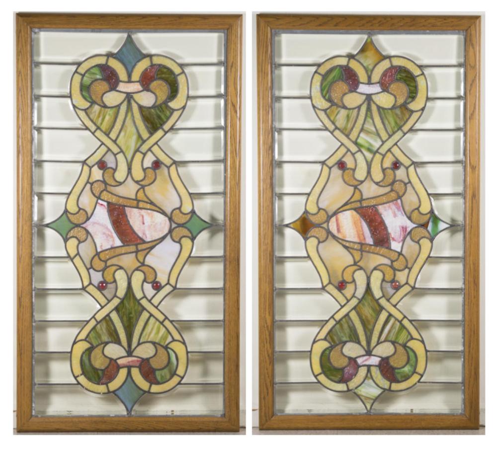 A PAIR OF STAINED LEADED AND 33f4f7