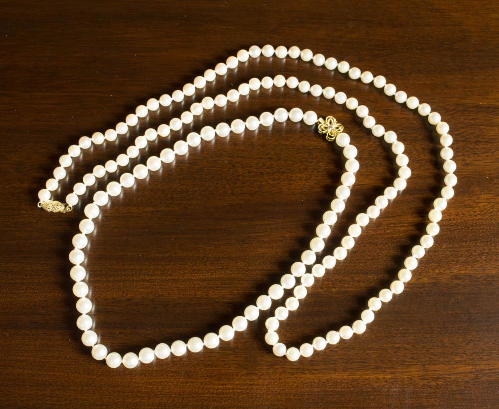 TWO WHITE PEARL AND FOURTEEN KARAT