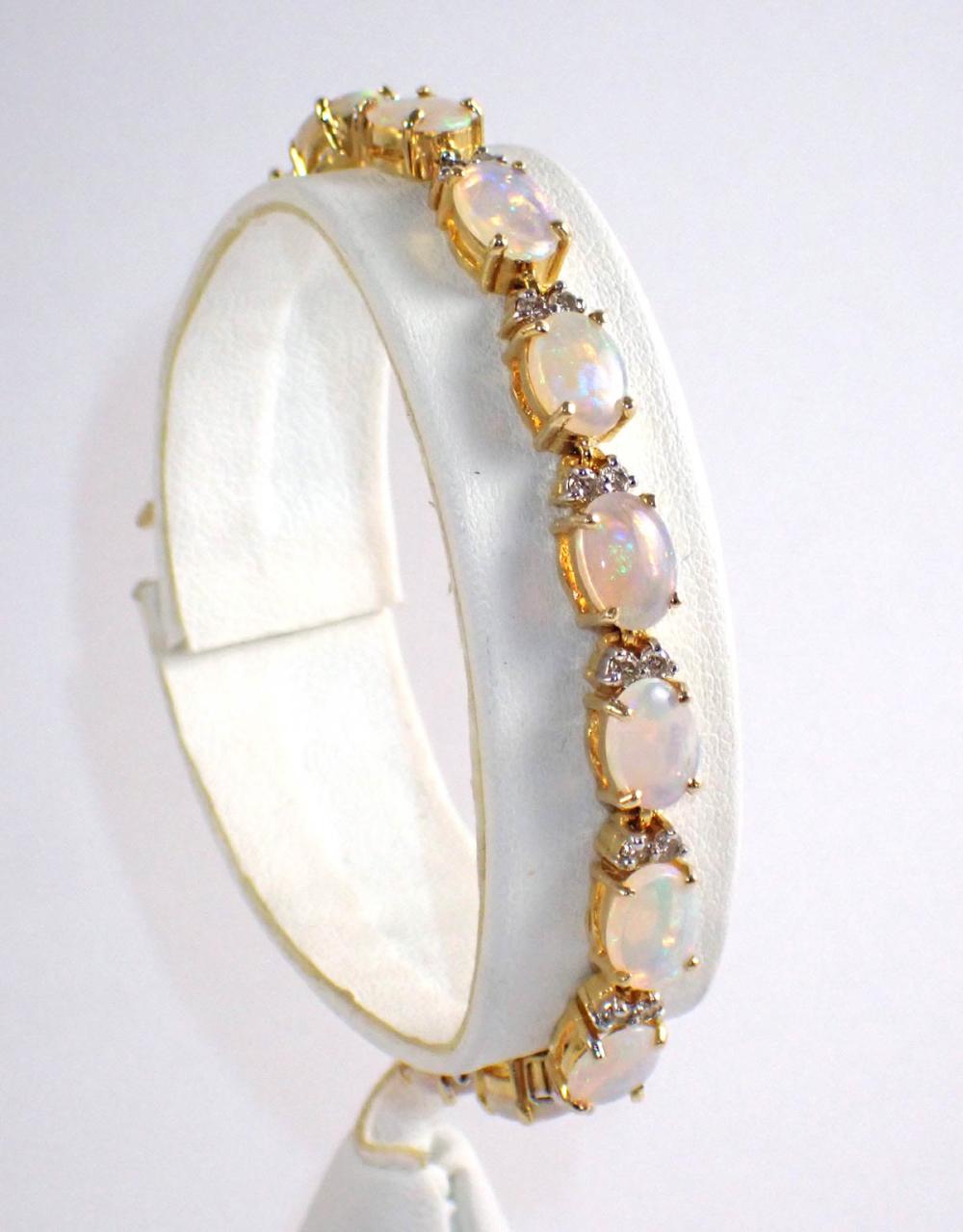 OPAL, DIAMOND AND FOURTEEN KARAT GOLD