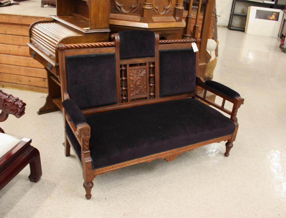 VICTORIAN CARVED AND UPHOLSTERED SETTEE,