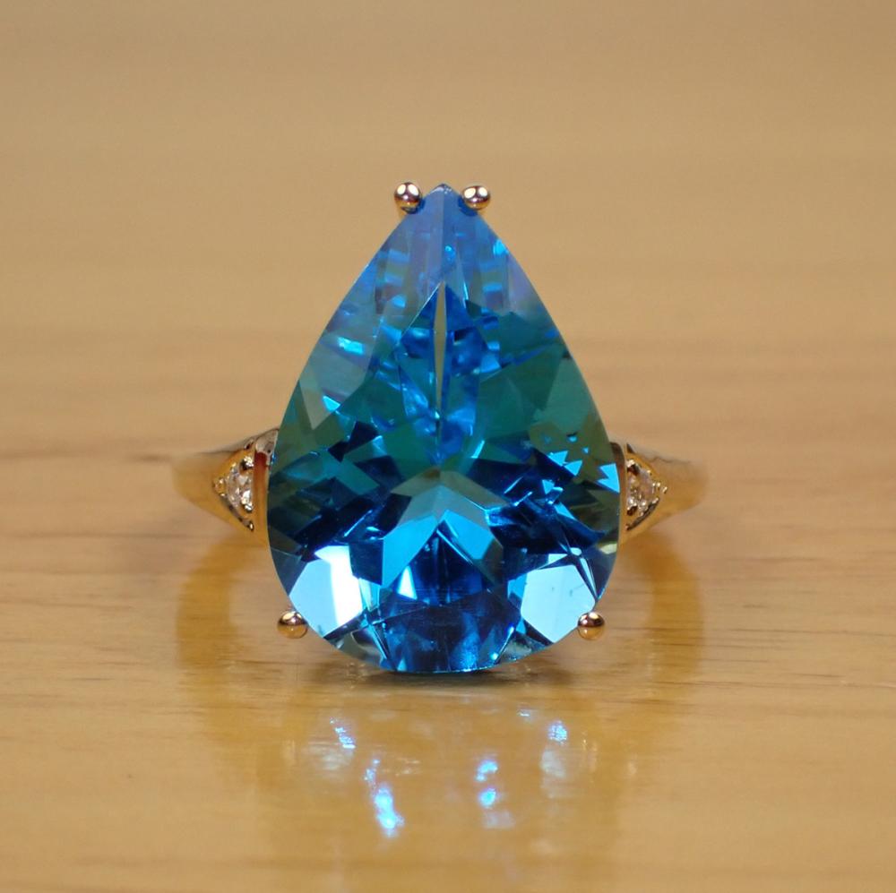 BLUE TOPAZ, DIAMOND AND FOURTEEN