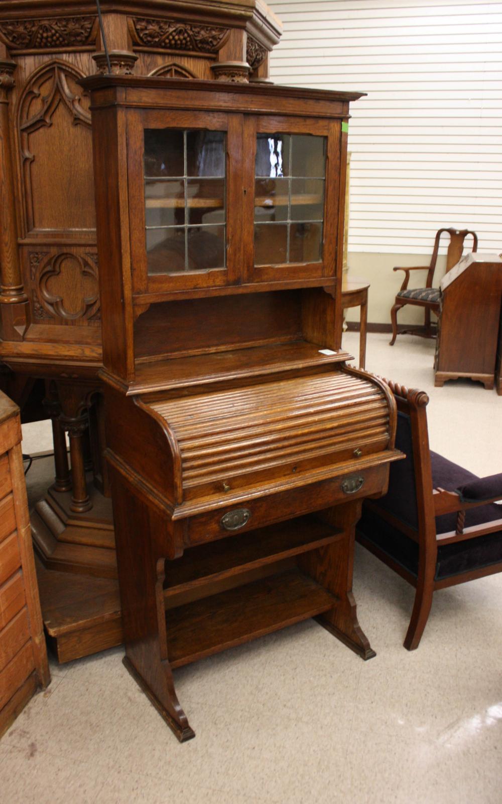 AN OAK ROLLTOP SECRETARY BOOKCASE,