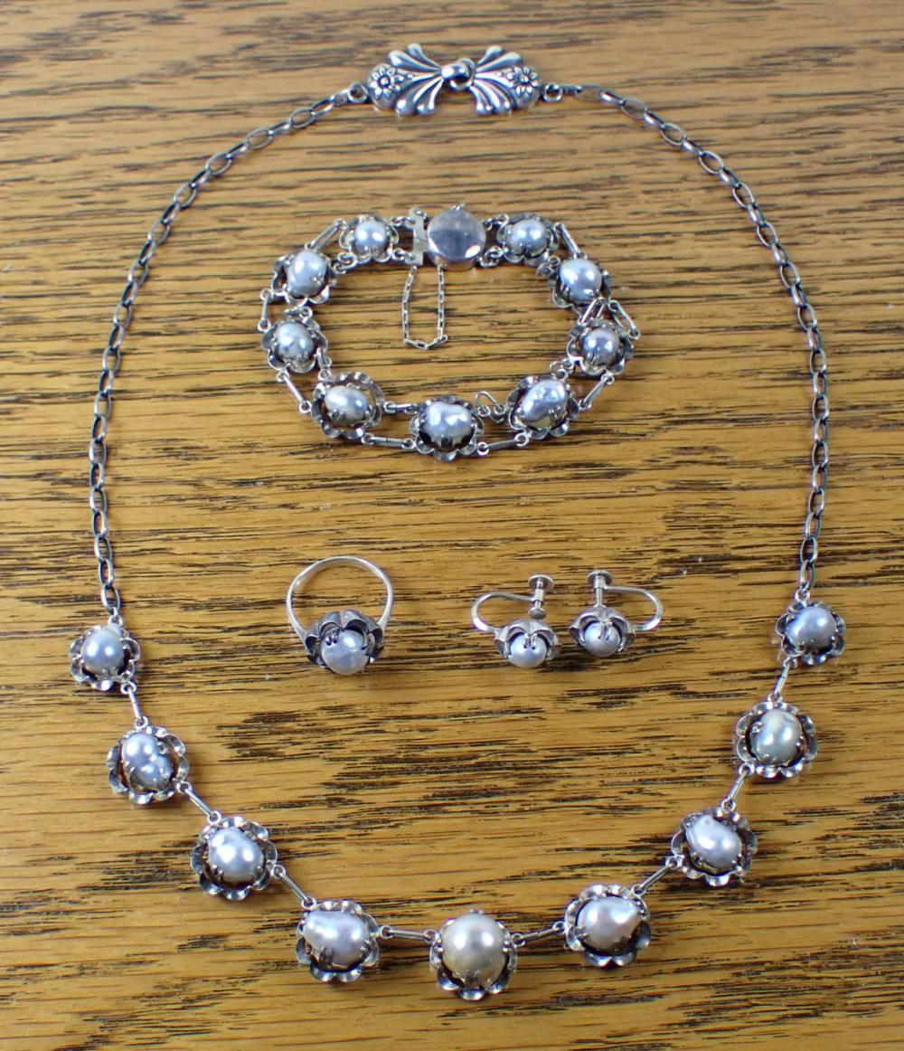 FIVE PIECE ANTIQUE PEARL AND SILVER