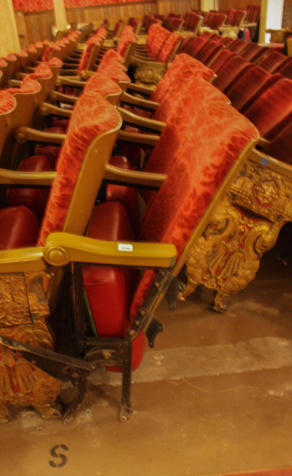 A ROW OF TEN VINTAGE THEATER SEATSA