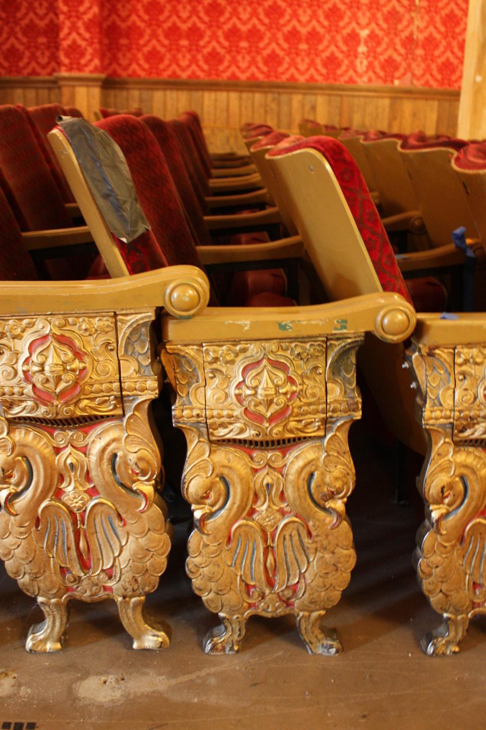 A ROW OF NINE VINTAGE THEATER SEATSA 33ff4d