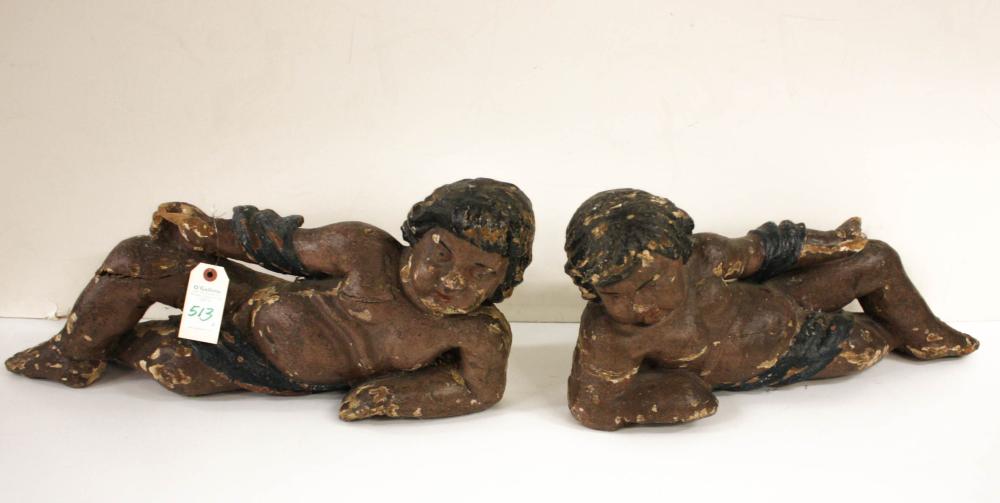 TWO EARLY CARVED WOOD RECLINING 34049c