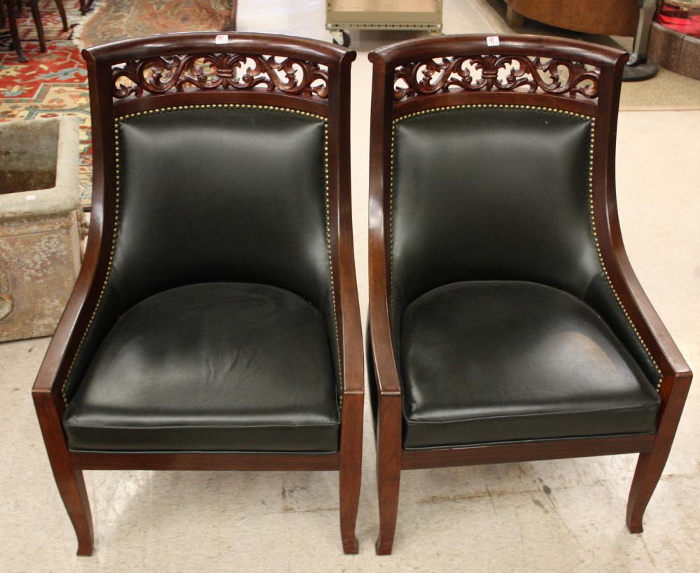 PAIR OF LEATHER AND MAHOGANY ARMCHAIRSPAIR 34052b