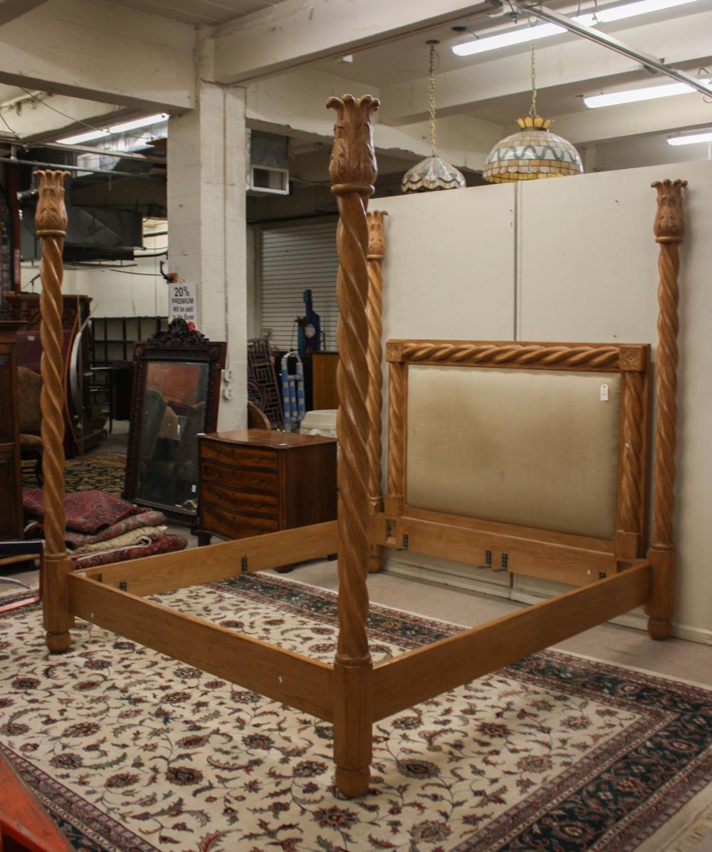 AN OAK FOUR-POSTER BED WITH RAILSAN