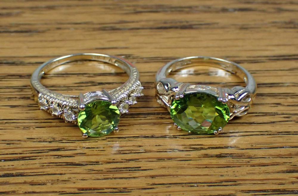 TWO PERIDOT AND YELLOW GOLD RINGSTWO