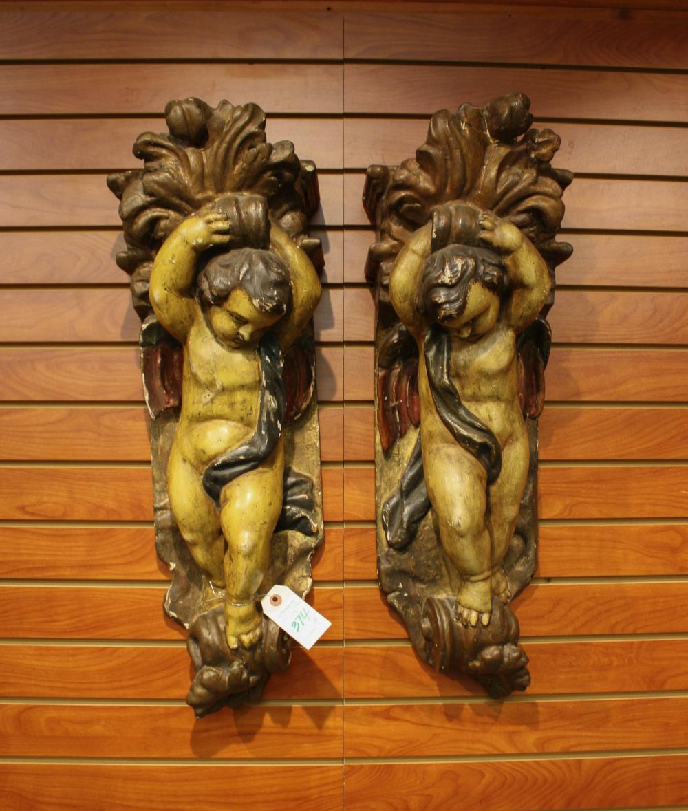 A PAIR OF CARVED WOOD AND MOLDED 3406b8