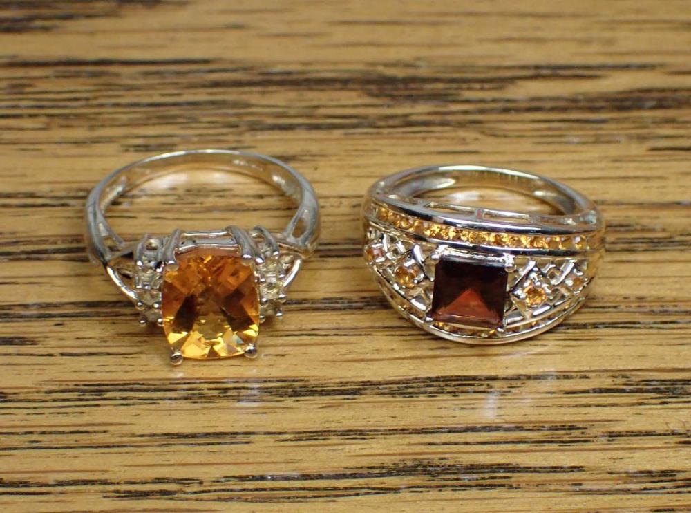 TWO CITRINE AND YELLOW GOLD RINGSTWO 34078a