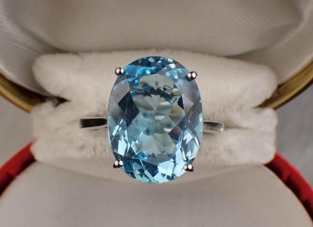 BLUE TOPAZ AND WHITE GOLD SOLITAIRE