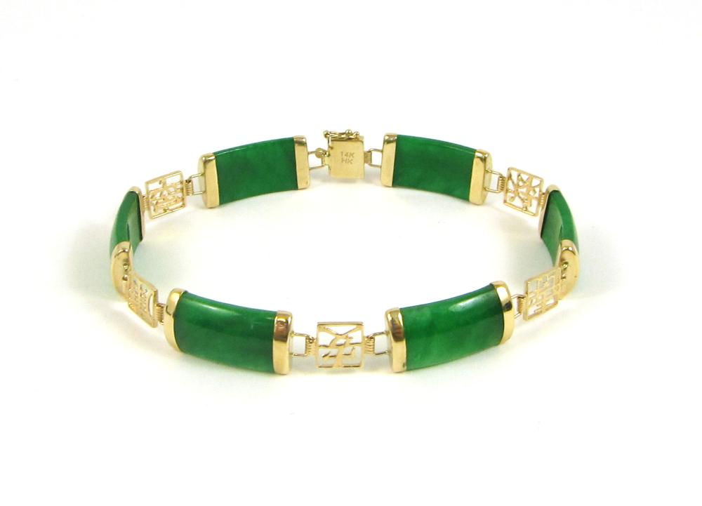 JADE AND FOURTEEN KARAT GOLD BRACELET,