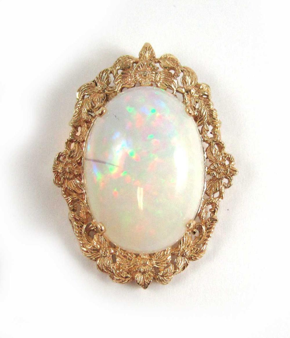 OPAL AND FOURTEEN KARAT GOLD PENDANT,