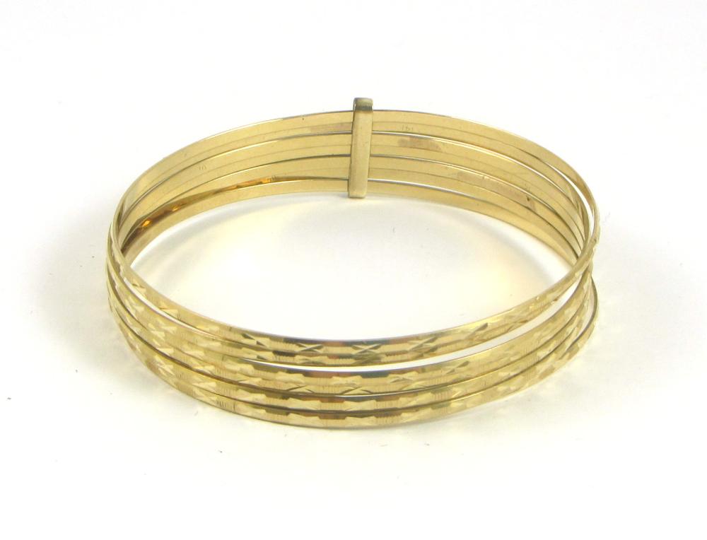 FOURTEEN KARAT GOLD SEVEN BANGLE 33e631