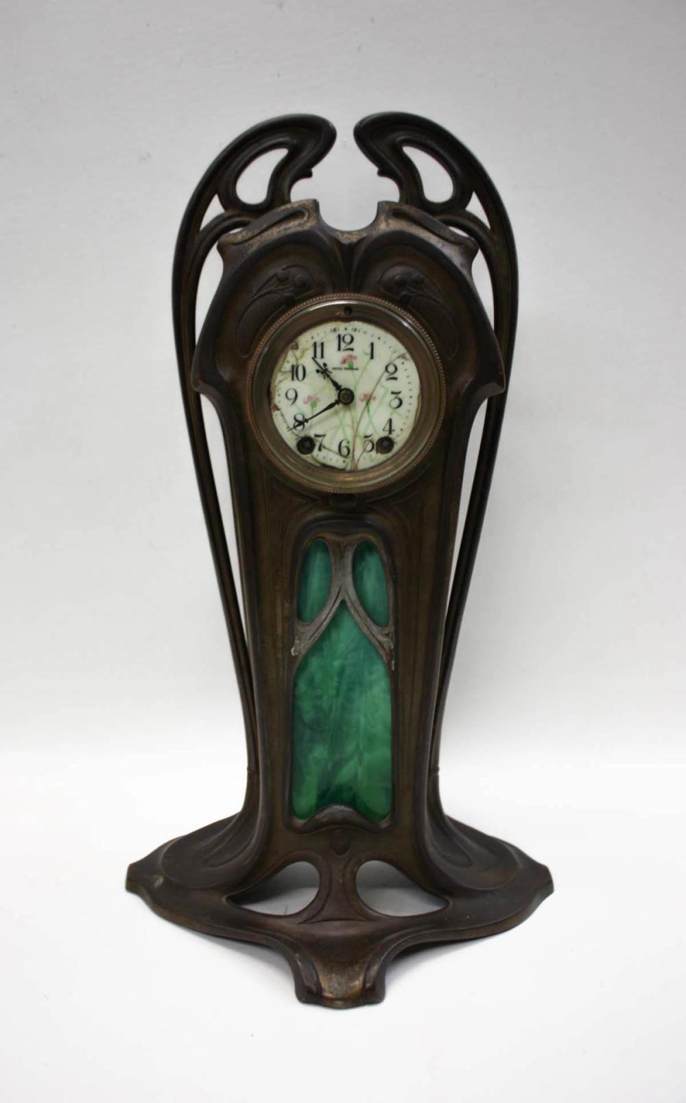 ART NOUVEAU SPELTER-CASED MANTEL CLOCK,