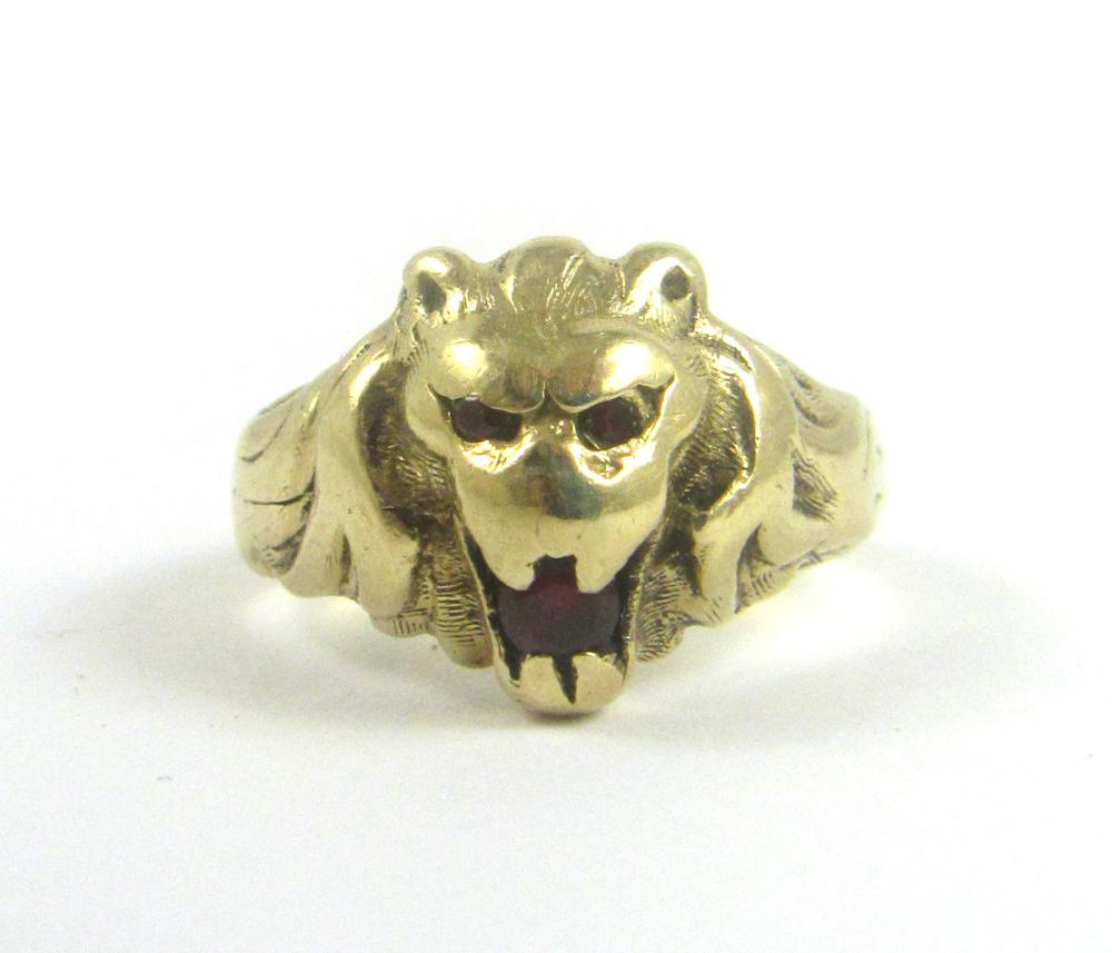 RUBY AND FOURTEEN KARAT GOLD LION 33e6b8