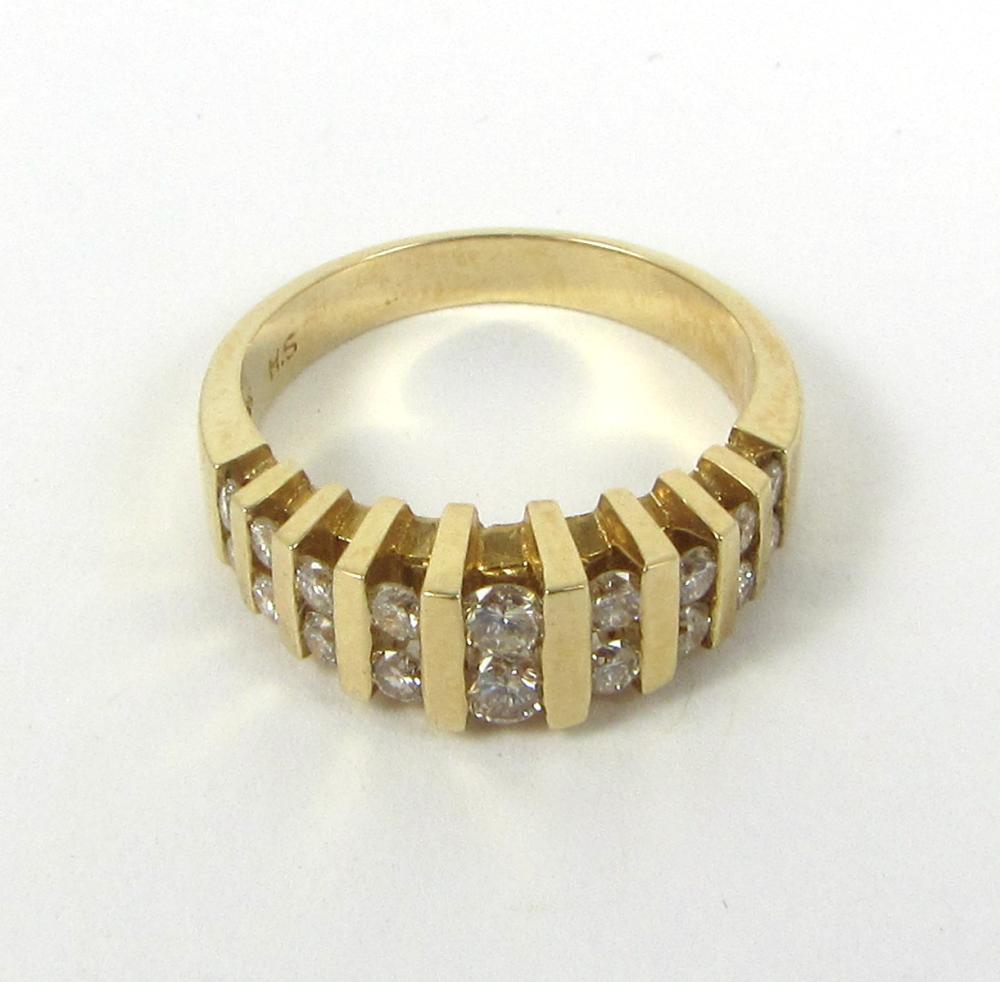 DIAMOND AND FOURTEEN KARAT GOLD 33e7b1