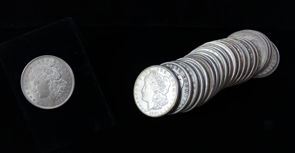 TWENTY ONE U S SILVER MORGAN DOLLARS  33e818