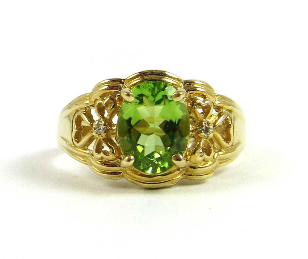 PERIDOT AND DIAMOND RING OVAL-CUT