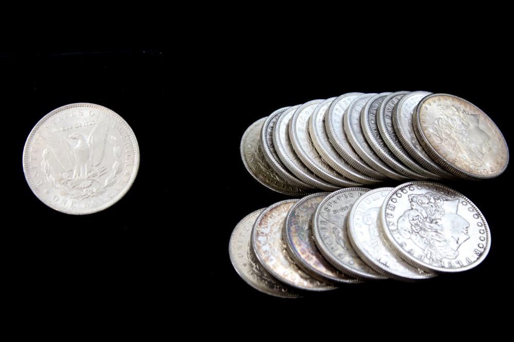 EIGHTEEN U.S. SILVER MORGAN DOLLARS: