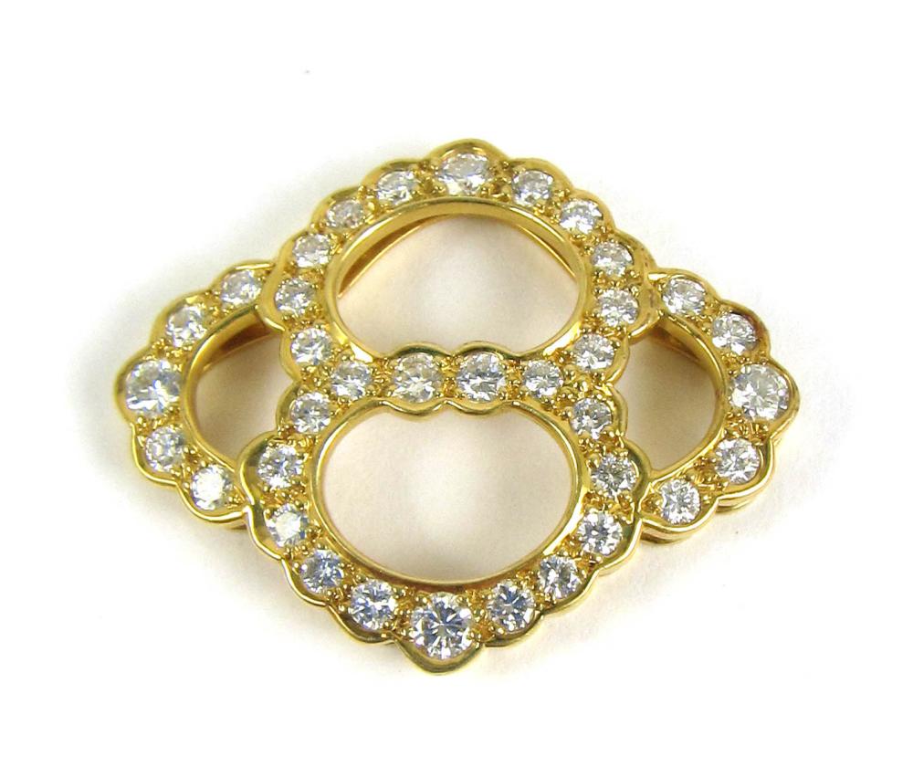 DIAMOND AND EIGHTEEN KARAT GOLD 33e910