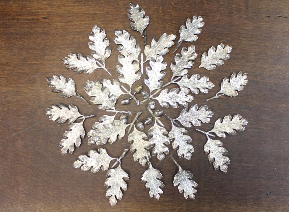 COLLECTION OF SILVER LEAF DECORATIONS,