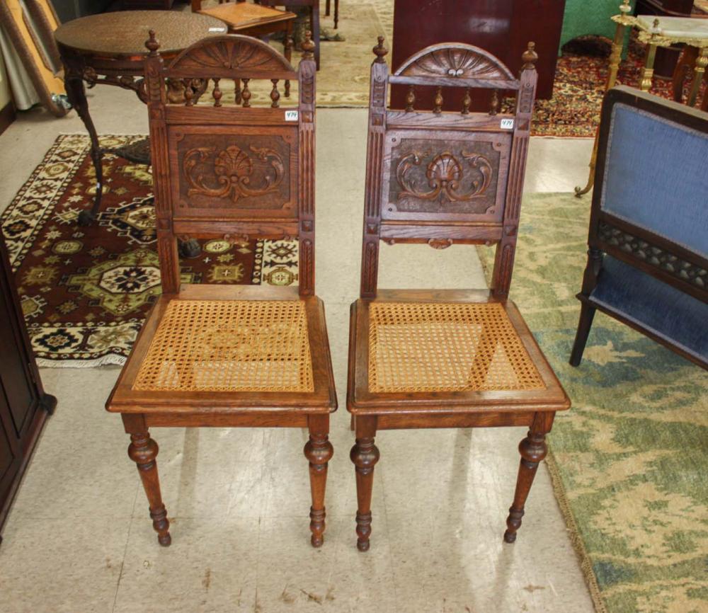 A SET OF SIX CARVED OAK DINING