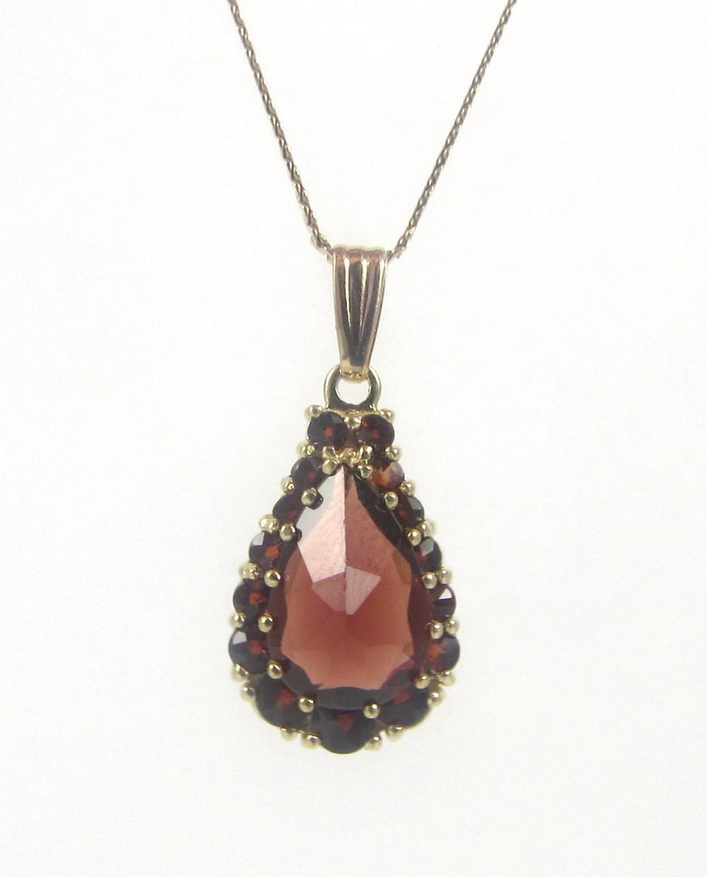 GARNET AND FOURTEEN KARAT GOLD