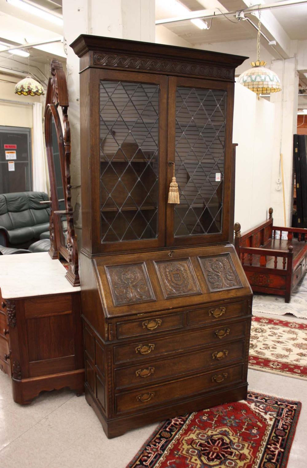 VINTAGE CARVED FEUDAL OAK SECRETARY