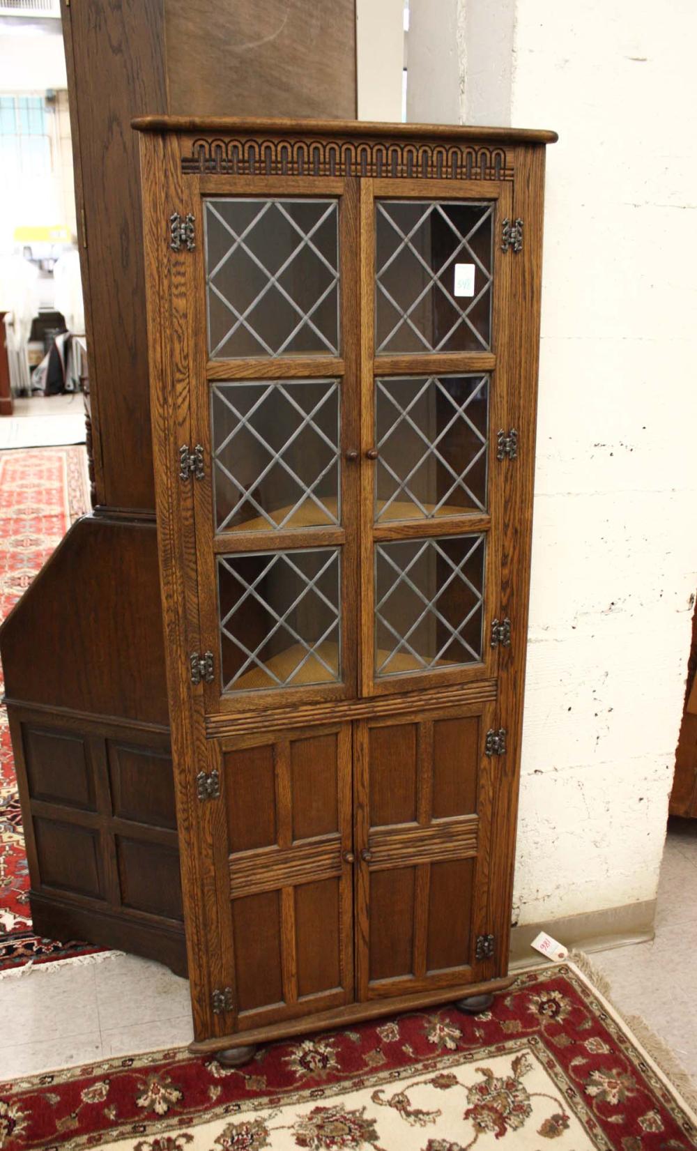 TUDOR STYLE OAK CORNER CABINET,