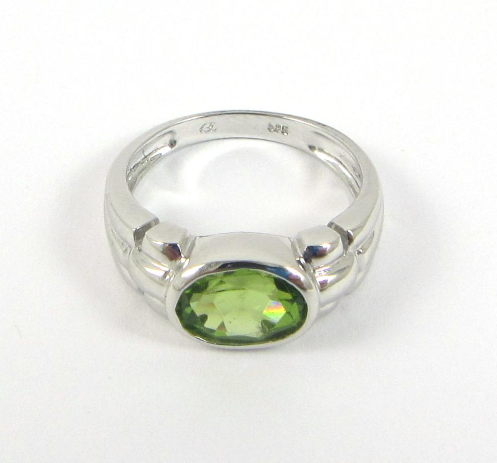 PERIDOT AND FOURTEEN KARAT WHITE