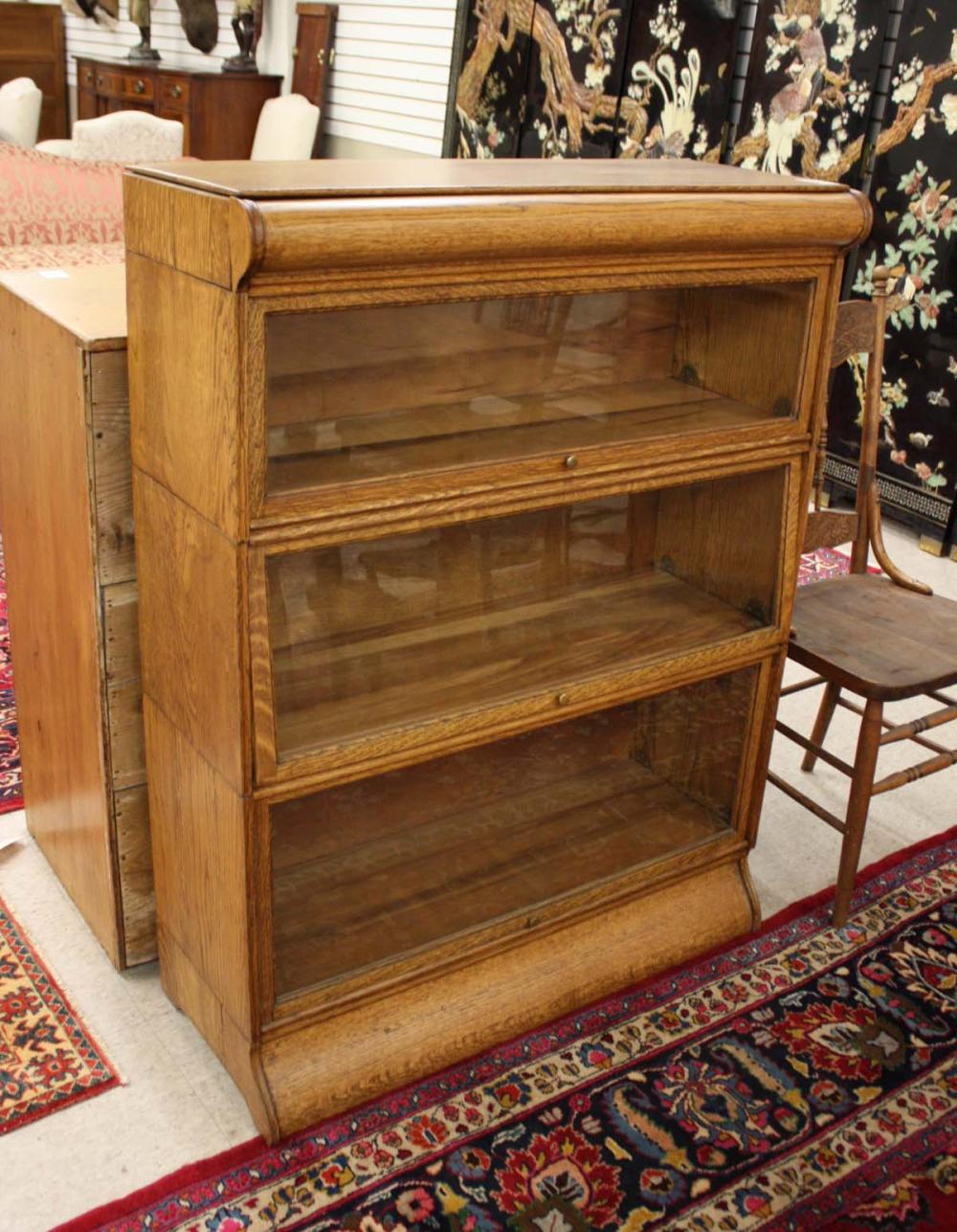 THREE-SECTION STACKING OAK BOOKCASE,
