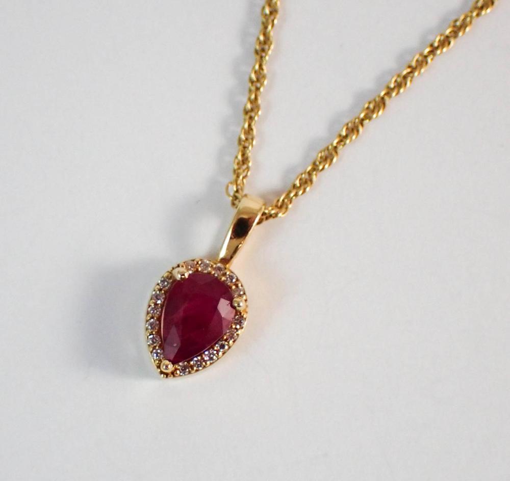 RUBY AND FOURTEEN KARAT GOLD PENDANT 33f08e