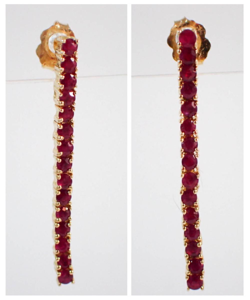 PAIR OF RUBY AND FOURTEEN KARAT 33f088