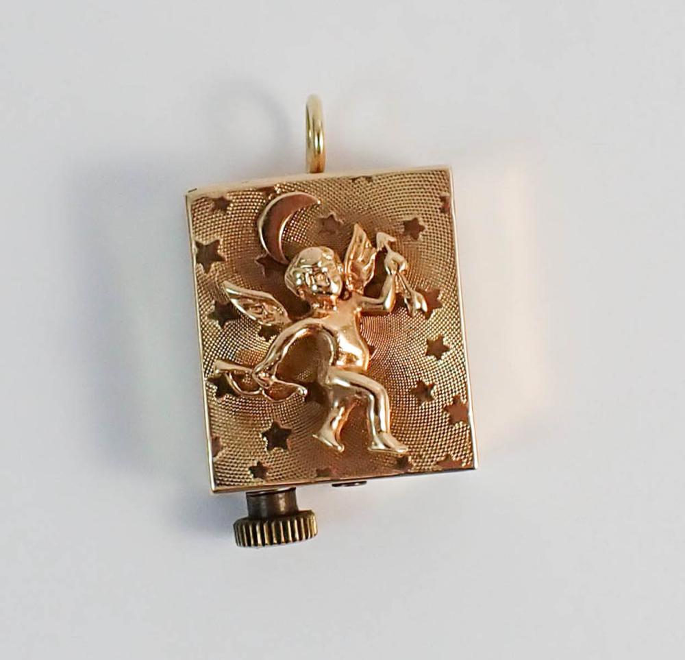 FOURTEEN KARAT GOLD MUSIC BOX PENDANT/CHARM,