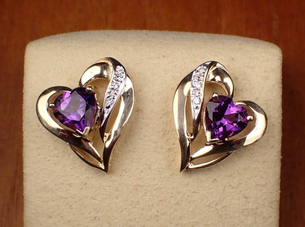 PAIR OF AMETHYST AND DIAMOND STUD