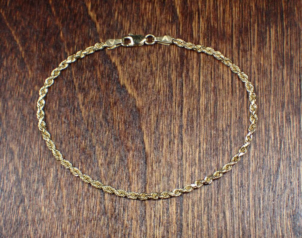 FOURTEEN KARAT YELLOW GOLD ROPE