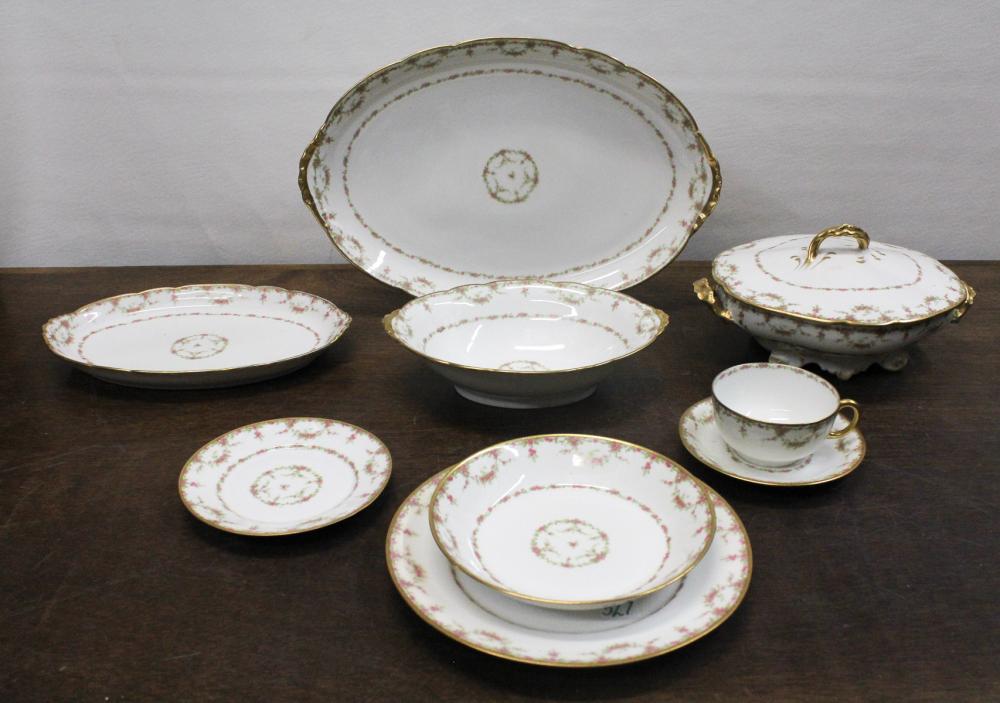 FIFTY-SEVEN PIECE LIMOGES CHINA
