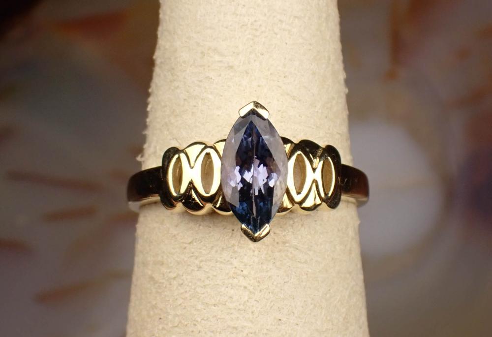 TANZANITE AND FOURTEEN KARAT YELLOW