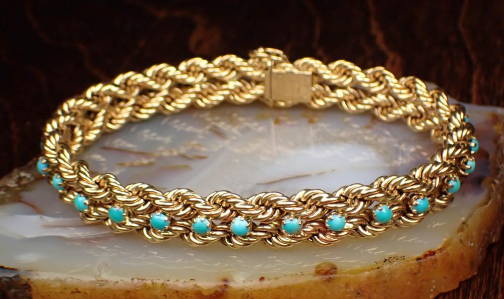 TURQUOISE AND EIGHTEEN KARAT GOLD