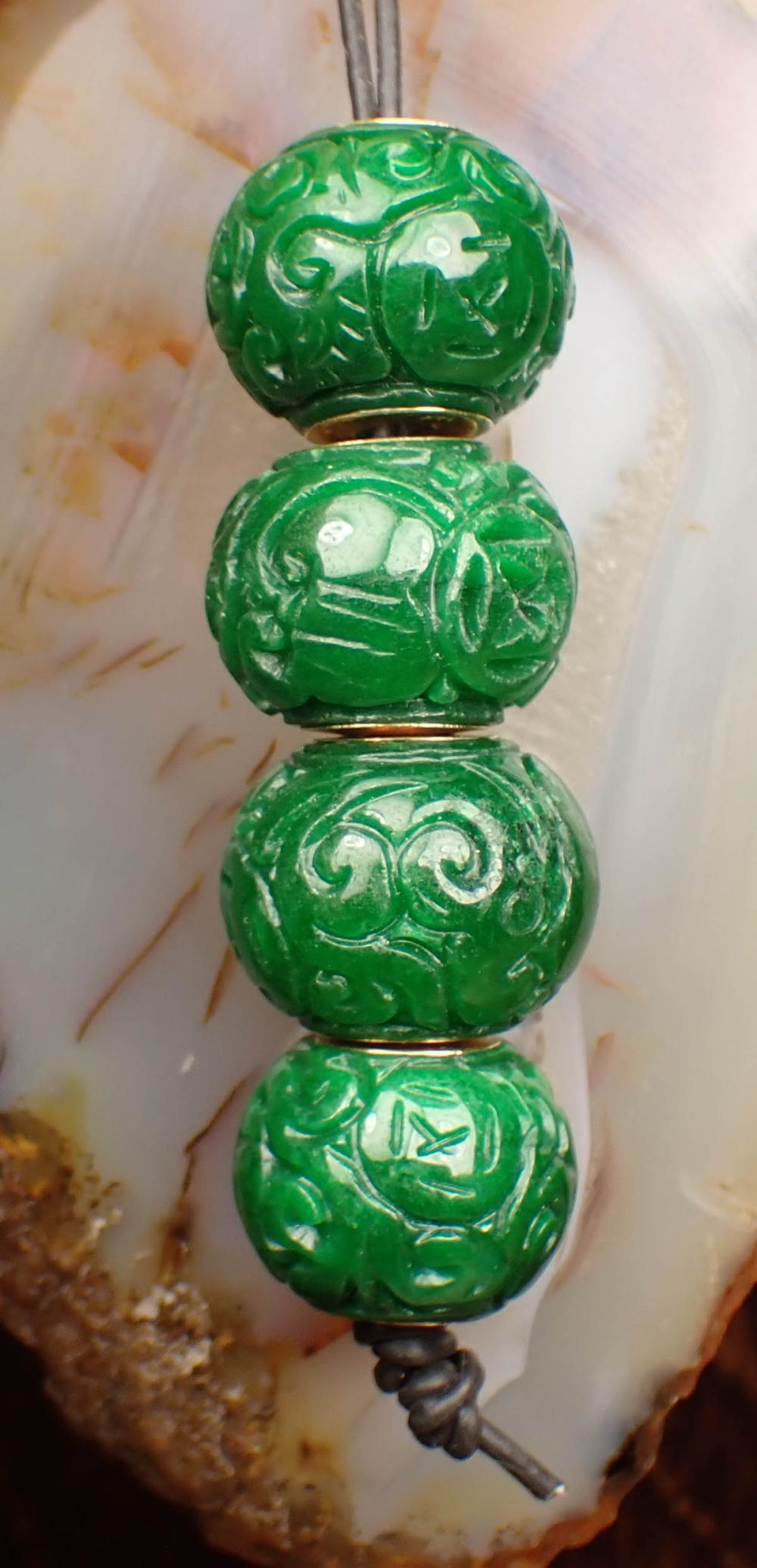 COLLECTION OF FOUR JADE AND GOLD 341ce0