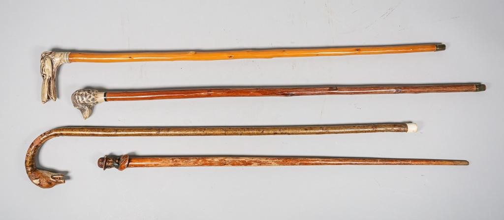 4 FIGURAL HANDLE CARVED CANES4 341d71