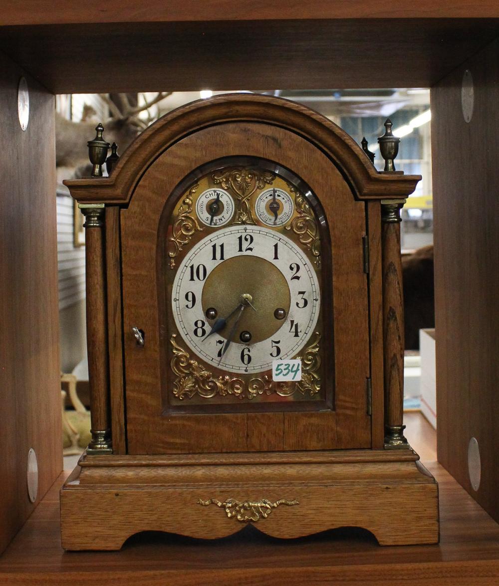 AN OAK CASED BRACKET CLOCKAN OAK CASED