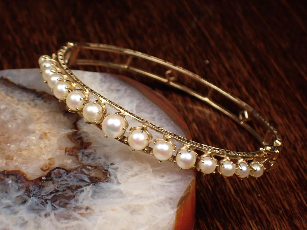 PEARL AND FOURTEEN KARAT GOLD BANGLE