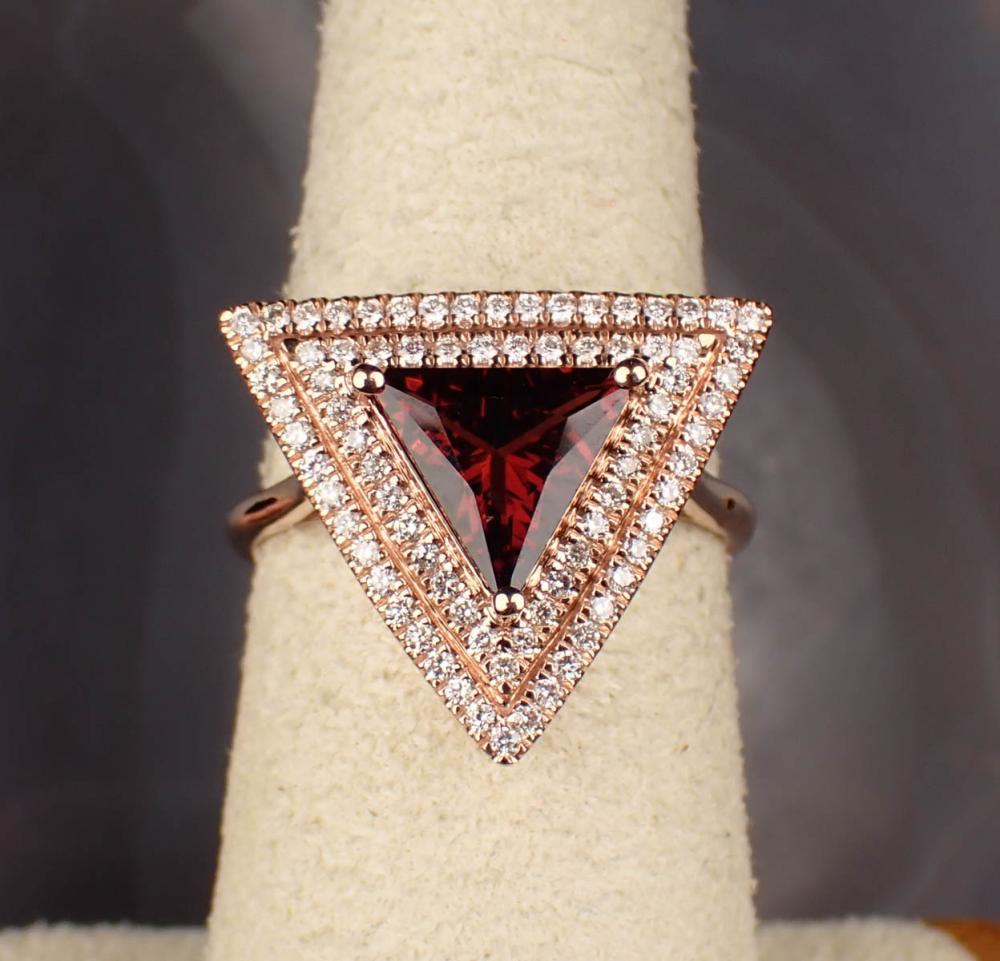 GARNET, DIAMOND AND FOURTEEN KARAT GOLD