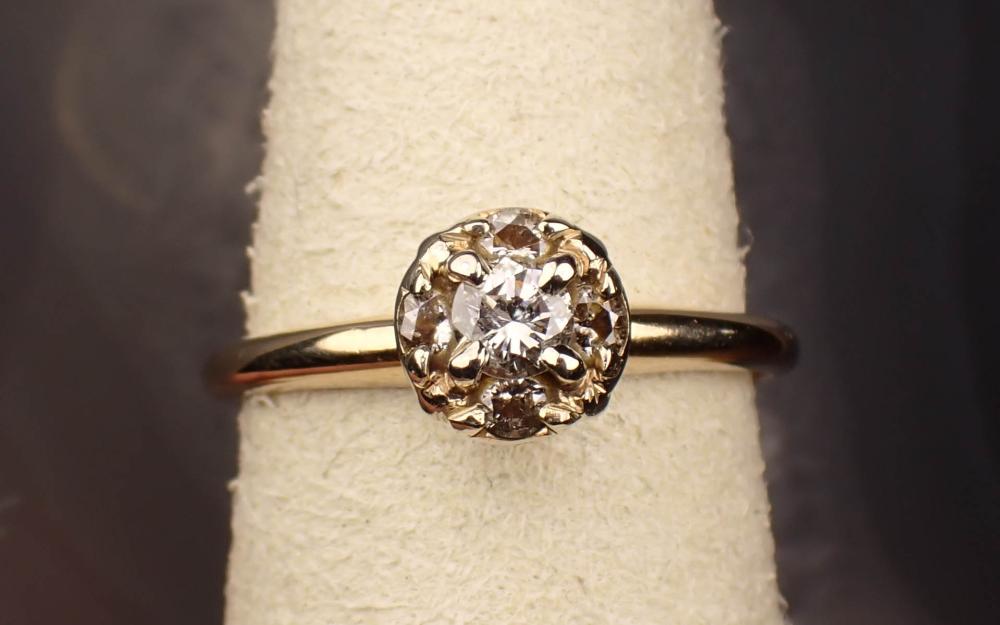 DIAMOND AND FOURTEEN KARAT TWO-TONE