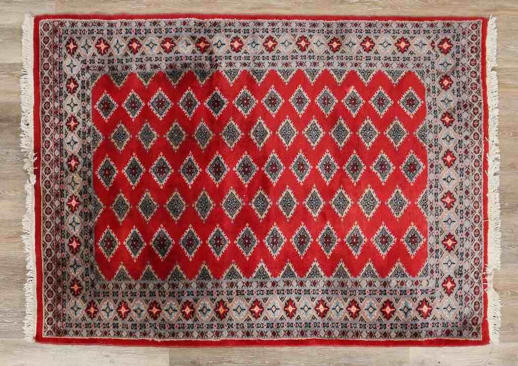 PERSIAN RUGPersian rug. Red field,