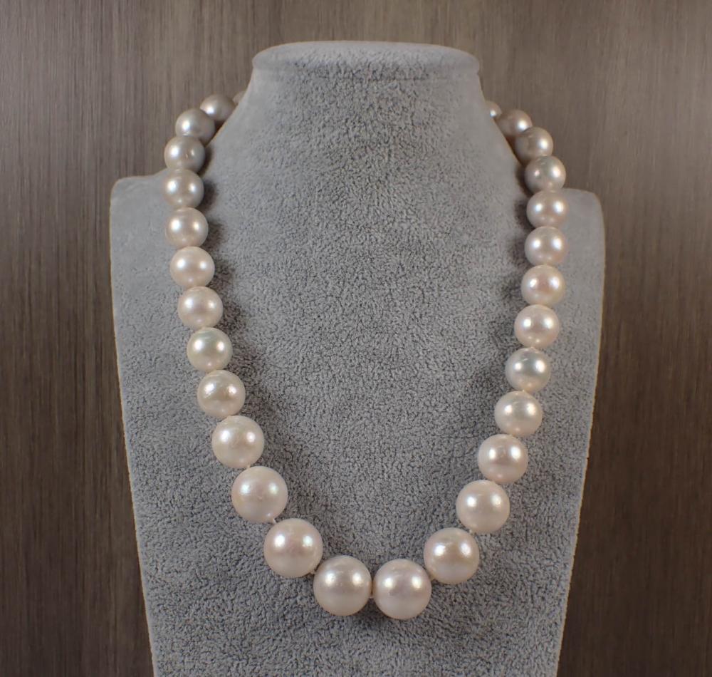 SOUTH SEA PEARL AND EIGHTEEN KARAT